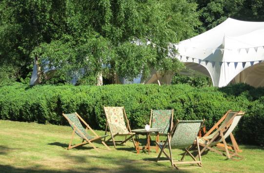 Quirky marquee and deck chairs at a wedding Quirky marquee and deck chairs at a wedding
